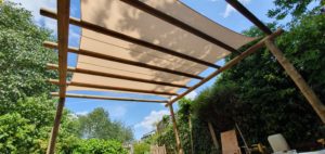 Bespoke pergola with a shade sail for a school