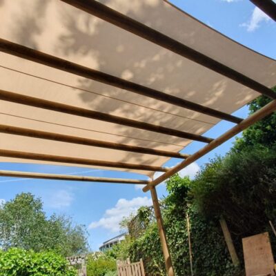 Bespoke pergola with a shade sail for a school