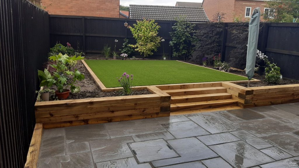 artificial grass, indian stone, & sleeper installation in Rotherham