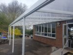 Outdoor school canopy installation in South Yorkshire – polycarbonate roof with powder-coated frame