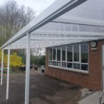 Outdoor school canopy installation in South Yorkshire – polycarbonate roof with powder-coated frame